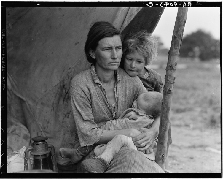 Nipomo, Calif. Mar. 1936. Migrant agricultural worker's family. Seven hungry children. Mother aged 32, the father is a native Californian. Destitute in a pea pickers camp, because of the failure of the early pea crop. These people had just sold their tent in order to buy food. Most of the 2,500 people in this camp were destitute.
